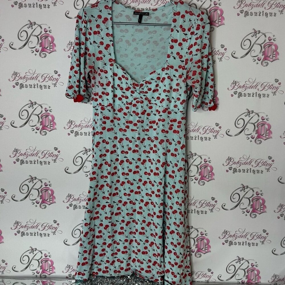 Sourpuss Cherry Print Dress in Light Blue and Red v neck stretchy bows sleeve